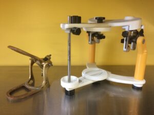 Image of two examples of a dental articulator